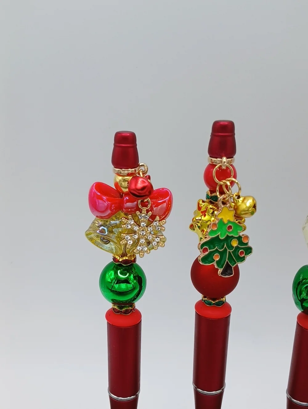 Festive Red Charm Pen with Holiday Decorations